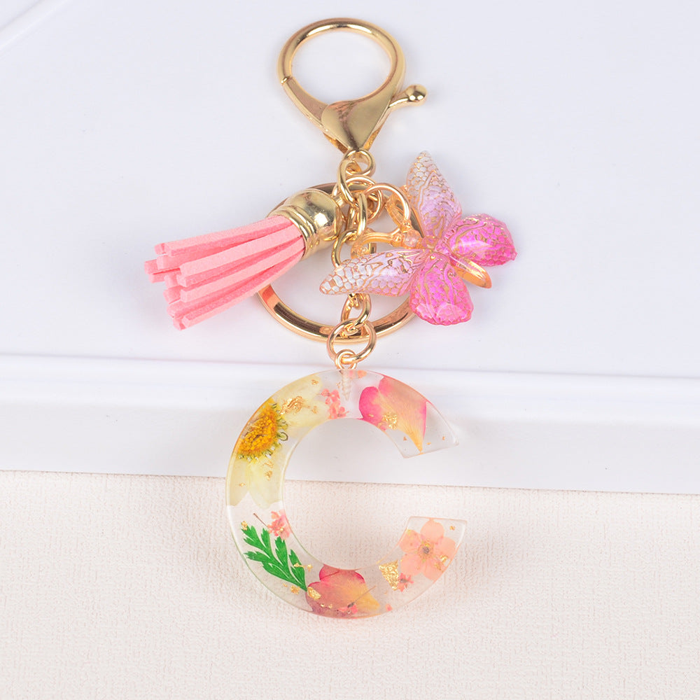 卸売ドライフラワーレター樹脂キーホルダー